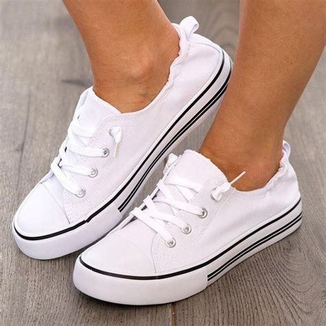 comfortable white canvas sneakers.